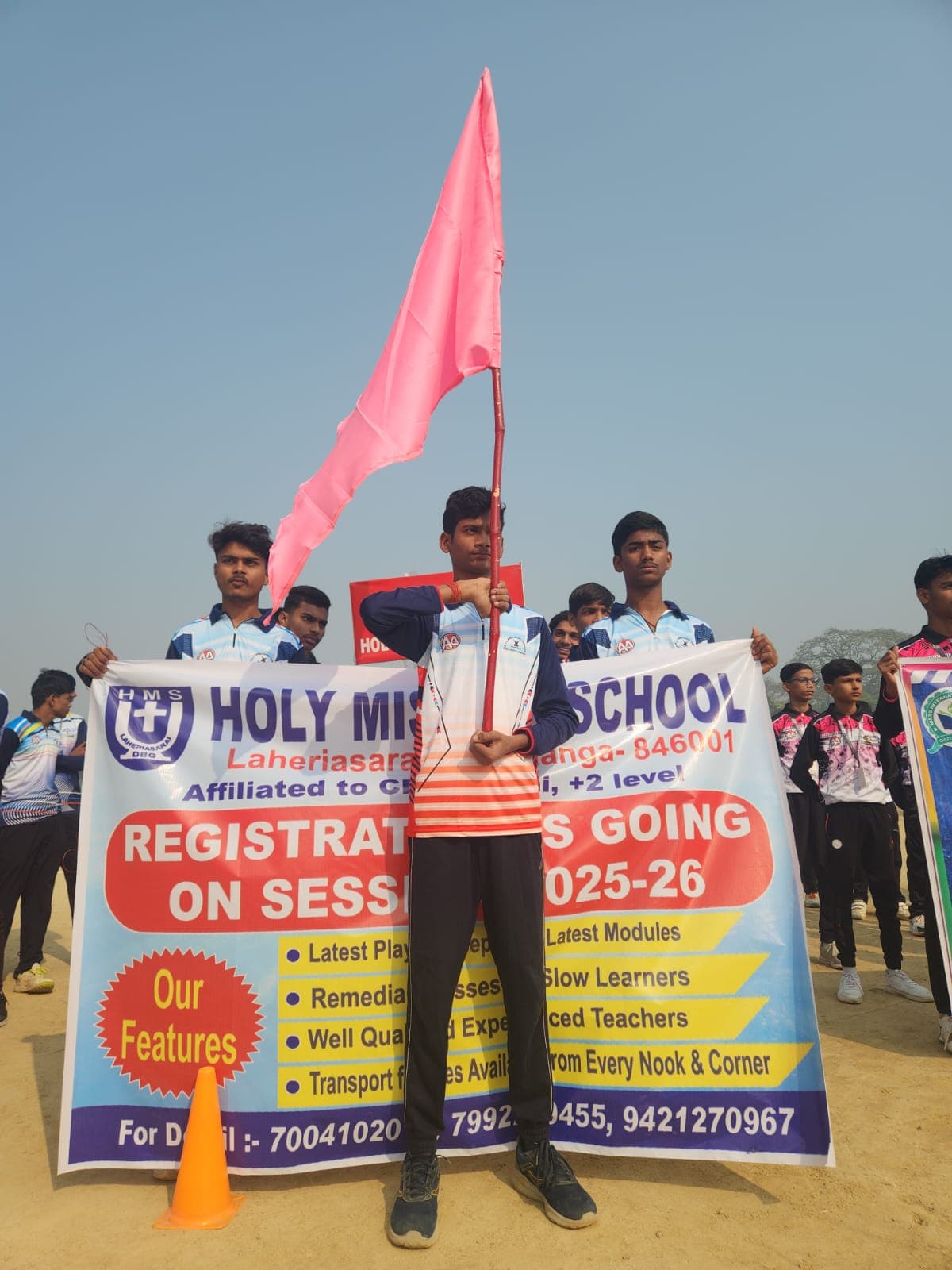 Holy Mission School teacher and students sharing a learning moment