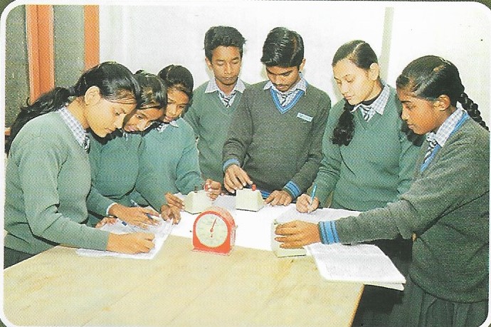 Holy Mission School students collaborating together