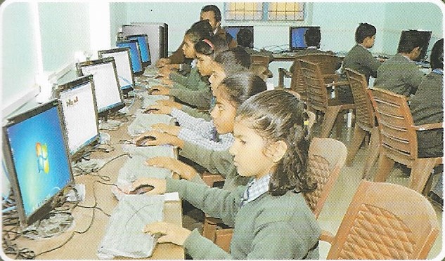 Holy Mission School computer lab session